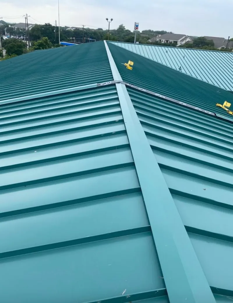 Green commercial metal roof ridge and valley for Metal Roof Repair in White Plains